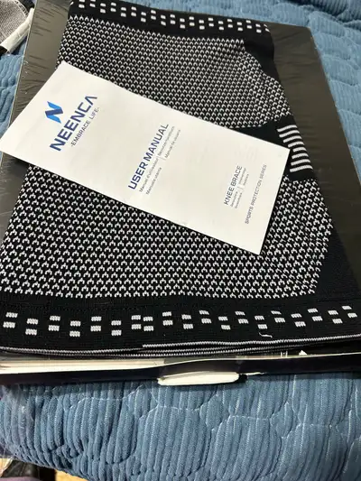 This is a new 2 pack pairs NEENCA Professional Knee Brace in black, size L-4XL. It's designed for sp...