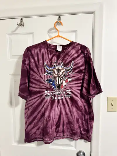 Men's burgundy tie-dye t-shirt. Features a bull skull graphic on the front and Sturgis Rally 2009 lo...
