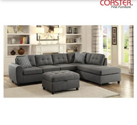 Stonenesse Reversible Sectional + Storage Ottoman in Grey