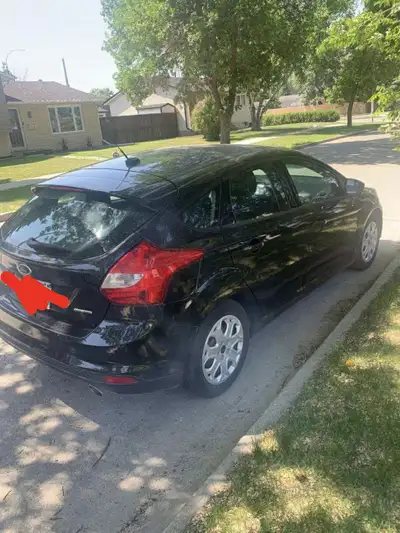 Selling my 2014 Ford Focus with 185,000 km. The car runs flawlessly and is great on gas. Comes with...
