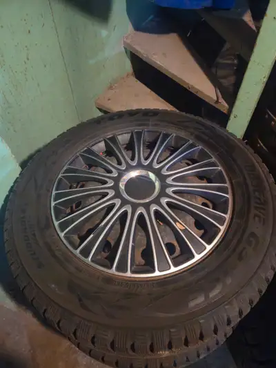 Selling a excellent and used 1 season (215/65R16) YOKOHAMA OBSERVE G3-ICE set of four wnter tires an...