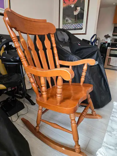 Solid oak full size rocking chair.good condition.