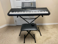 Portable WK-110 76 Casio keyboard with stand and seat