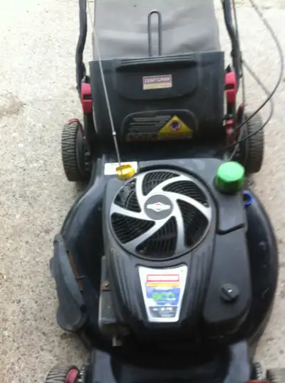 self propelled 21in Craftsman ( EZ Walk ) powered by 8.75 series Briggs & Stratton motor, (190 cc),...