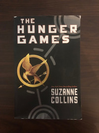 The Hunger Games by Suzanne Collins (Paperback Novel)