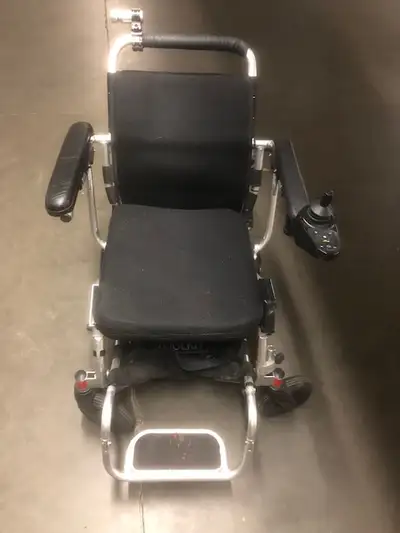 Power wheel chair that folds up, View more