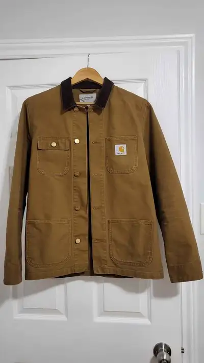This is a classic Carhartt WIP Michigan chore coat in a brown canvas. It is in mint condition. Selli...
