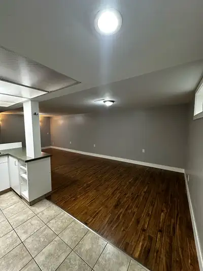 WHOLE SUITE - $1400 + 40% utilities Welcome to this bright and spacious 2-bedroom basement suite loc...