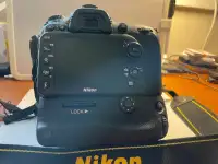 Nikon D7100 with power attachment, Nikon cover, etc. +++
