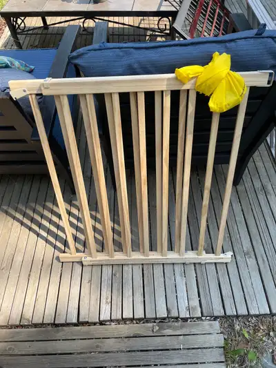 Two baby gates. Wooden one is in excellent condition. Metal one is an Evenflo secure step and is in...