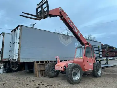 2006 Skytrak 6042 Telehandler 7000 hours 6000 pound capacity Auxilary hydraulic with rotating carria...