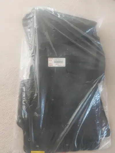Genuine Toyota Floor Mat, brand new- still inside the bag. Never used. Fits Prius C -any year. Broug...