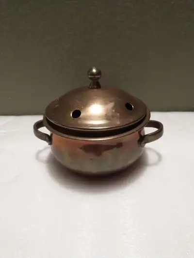 Vintage brass pot poturri., View more