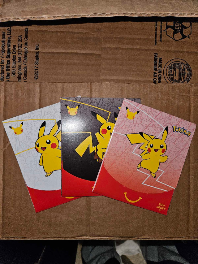 Pokémon 25th Anniversary McDonald's Promo SEALED CARDS in Toys & Games in Calgary