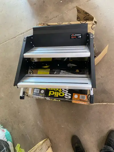 30” Lippert solid step 2 stair , with adjustable drop legs