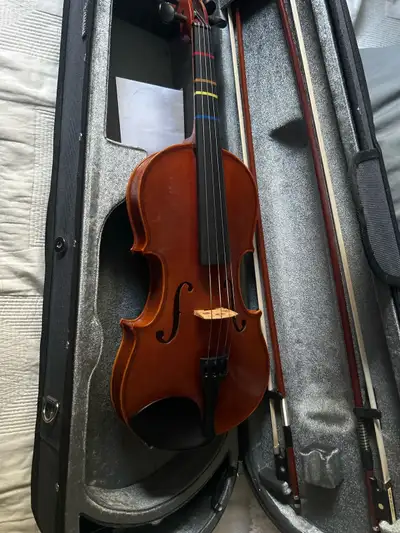 Comes with rosin, additional strings, 2 bows, head rest. Case in pristine condition Price could be n...
