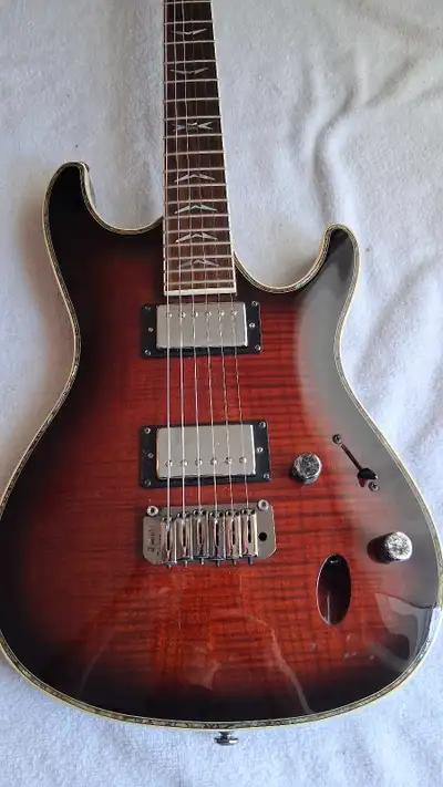 SA series beatiful guitar loaded with epiphone les paul humbuckers sounds great ..fast neck.. plays...