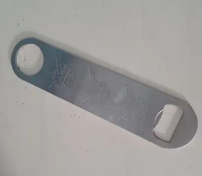 Smirnoff Ice bottle opener - in good condition with a few minor scratches and scuffs from age - no n...