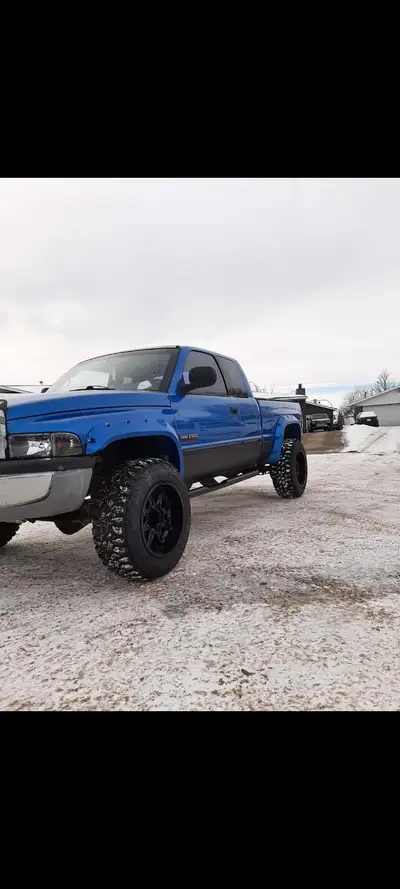 Good running second gen up for grabs No blow by 4x4 5.9L Cummins Straight piped 4 inches -44 rims wi...