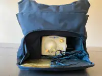 Medela double electric breast pump in tote bag. Mobile
