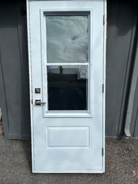 Exterior Door with sliding screened window