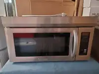 KitchenAid over the stove Microwave and Fan combo.