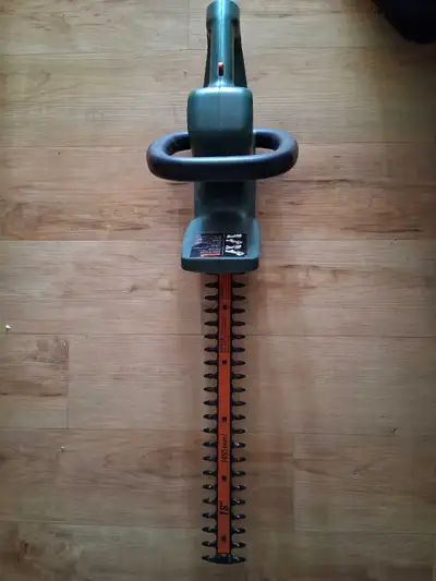 Black and Decker electric hedge trimmer. Used once last season, twice the year before. Excellent con...