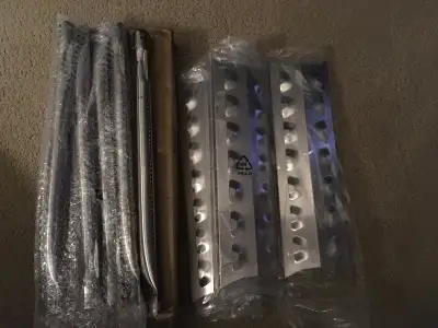 New stainless steel replacement bbq burner and heat plate set. 5 - 14 to 15”x 4.25 heat plates 5 - 1...