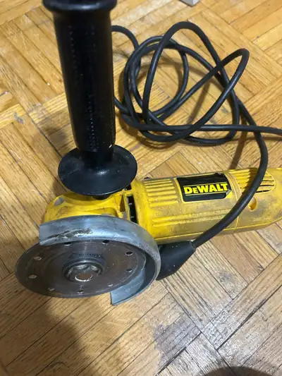 This reliable DeWalt DW400 4-1/2 inch angle grinder is ready to help you tackle your next home impro...