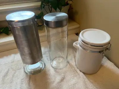 3 canisters, good clean condition, White canister is 8" H, the other 2 are 11" H and 11.5" H, widths...