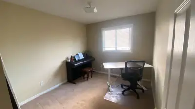 A bright, spacious room is available for rent in a clean and quiet 3-bedroom townhouse located in th...