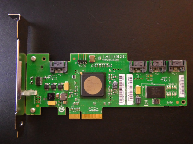 HP LSI Logic SAS3041E-HP 4-Port PCI-e SAS SATA RAID Controller in System Components in Markham / York Region