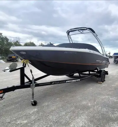 Year: 2021 - Mercury 200HP - Hours: 158 - Four Winns trailer with swing tongue - Four Winns OEM fold...