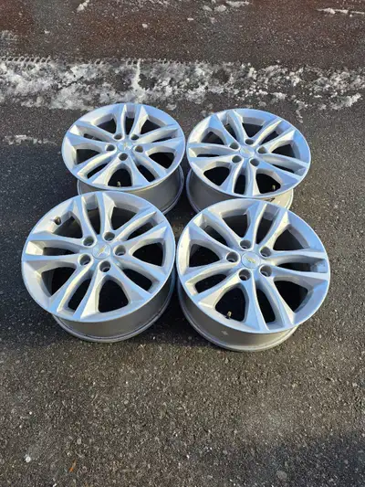 One set of 17 inch, used on Chevy Malibu, 17x7.5, 5x105, ET 45; One set of 18 inch, used on Chevy Cr...