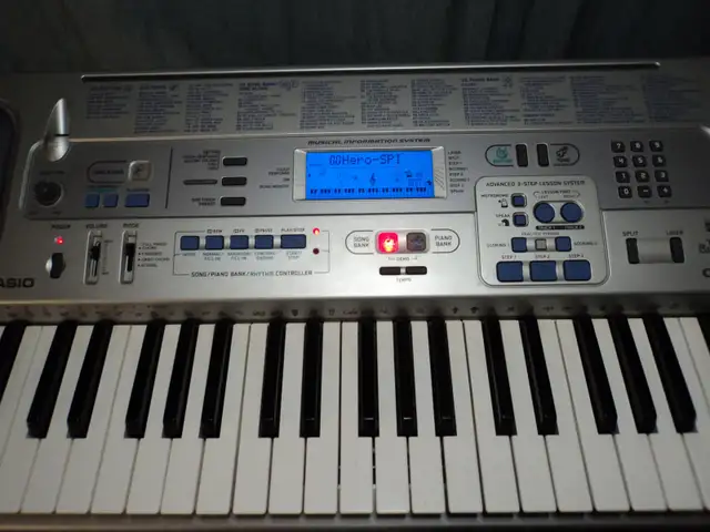 Casio CTK-591 Full-Size 61 Key Keyboard with Song Memory Record64728172316803123