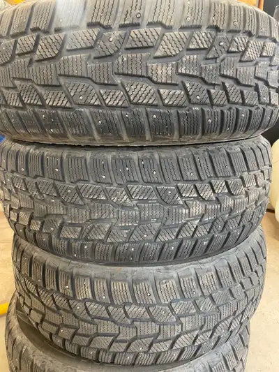 Studded winter tires 215/60R17 Cooper Evolution tires.