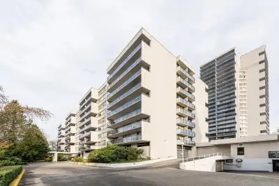 Bright top-corner suite with wonderful views in the heart of the city of Lougheed, steps from SkyTra...