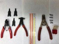 Assorted Snap Ring Pliers Sets, Some with replaceable tips.