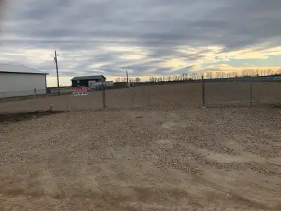 Available for rent/lease: a spacious 2-acre commercial empty lot. Gravel, Fully fenced and gated Eas...