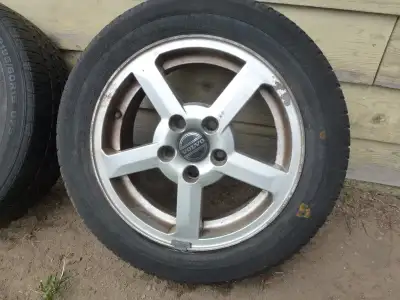 Located in Port Elgin, Ont. 15 inch Volvo Ariane 5 spoke rims. Tires are no good but do hold air. Ri...