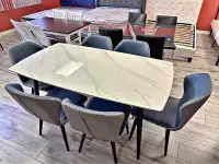 Brand new Marble Glass dining table with 6 chairs