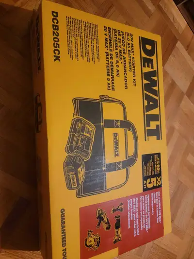 I'm selling a brand new DeWalt 20V MAX starter kit (DCB205CK) with a 5.0 Ah battery, perfect for pow...