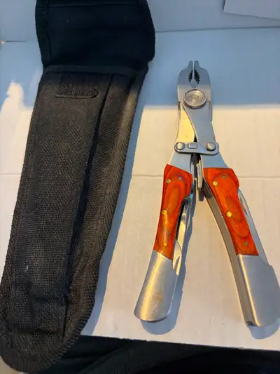 K101 COVO Multi-Tool Pliers with Wood Handles Asking: $30.00 Condition: Used, in excellent shape, CO...