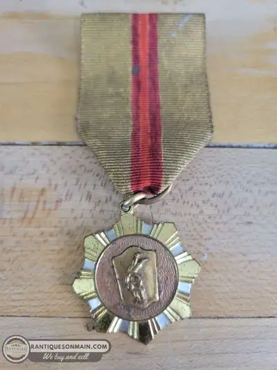 Unique vintage wrestling medal measuring approximately 4" high. Appears to be pre 1950's.