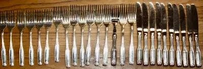 STAMPED ON BACK "ONEIDA LTD. SILVERSMITHS",10 KNIFES,9 LARGE FORKS,13 SMALL FORKS,8 SPOONS ALL IN GO...
