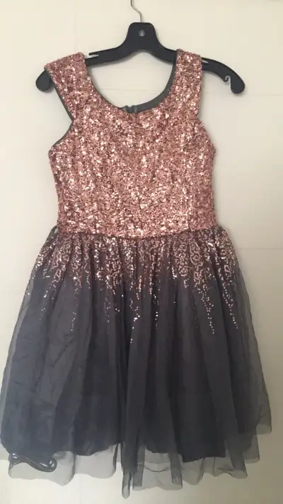 I am selling a collection of girls' dresses, each with its own unique style and charm. Included are...