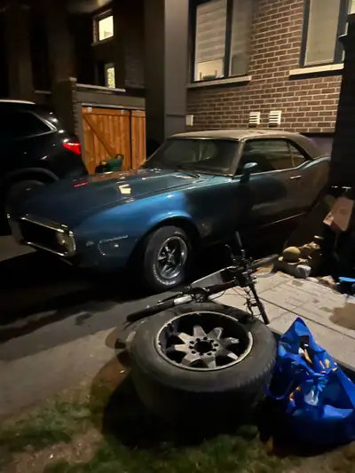 This is a used, 1968 Pontiac Firebird, a classic muscle car with a distinctive style. As you can see...