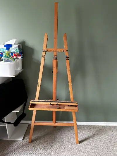 Wooden adjustable painting easel. Used but works. Pick up only