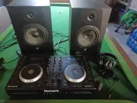 Turn table with speakers and headphones.