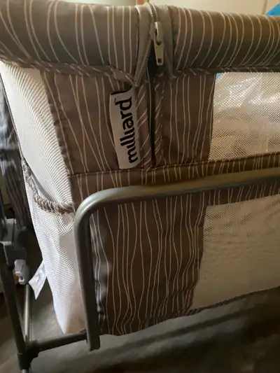Great Milliard bassinet - sturdy, good quality with easy bedside mode, height adjustment and carry b...